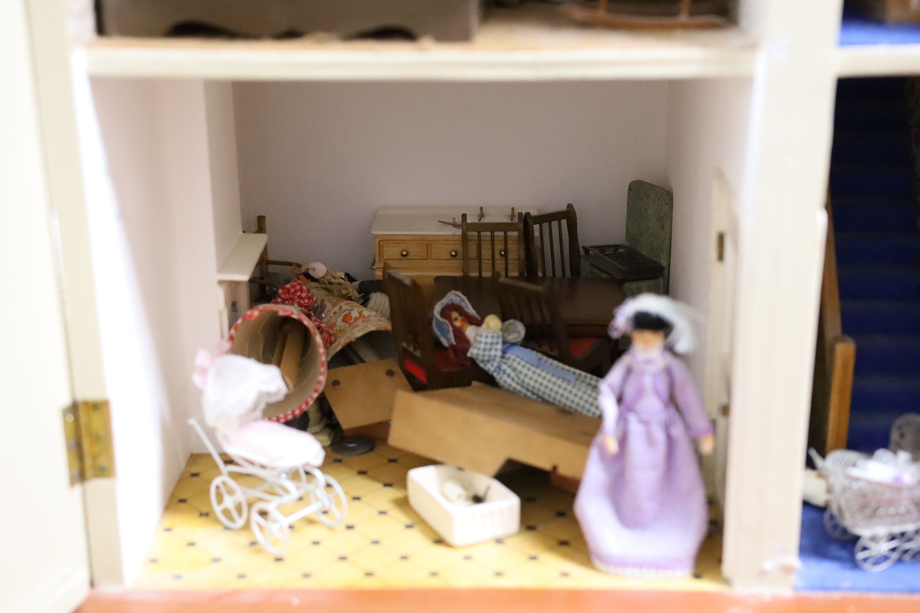 A dolls house, length 74cm, depth 39cm, height 66cm